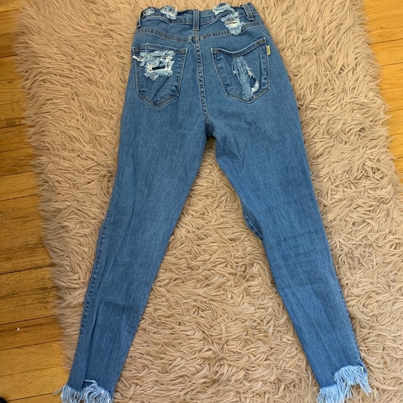 High-waisted Ripped Jeans - Picture 3 of 4